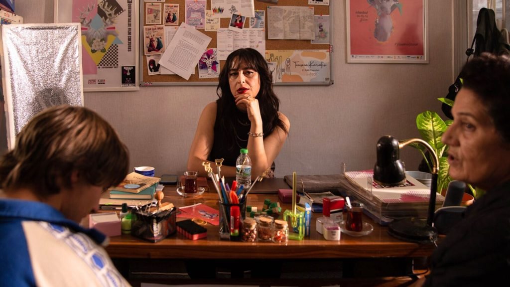 Left to right: Lucas Kankava, Deniz Dumanlı, and Mzia Arabuli in Levan Akin's 'Crossing'.